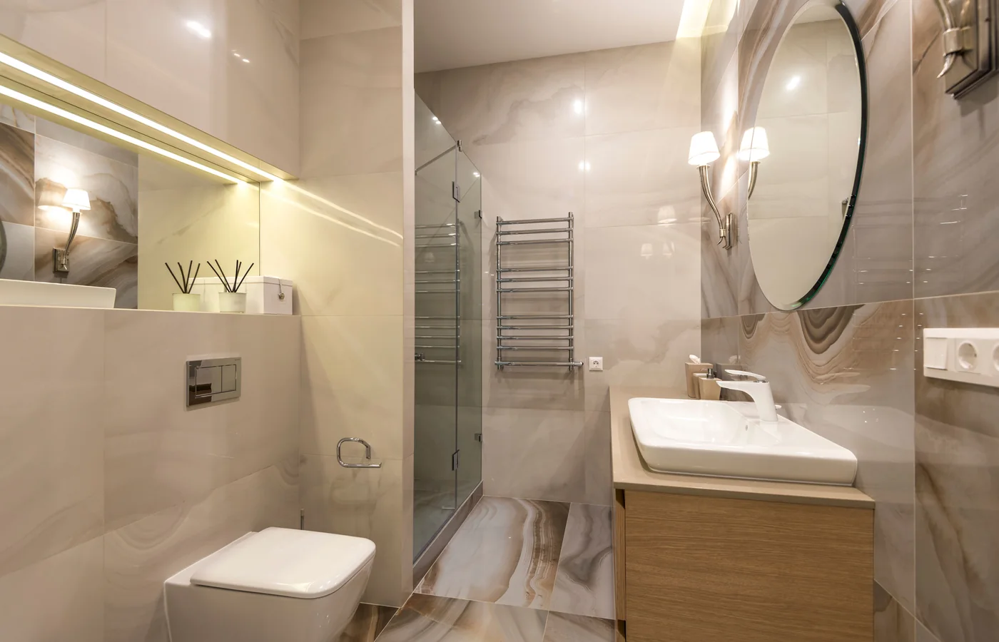 Finished bathroom with walk-in shower and wall-hung basin